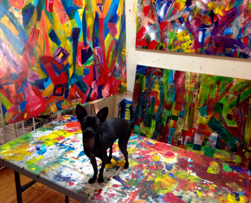 Ginger in the art studio of Los Angeles abstract painter Nestor Toro