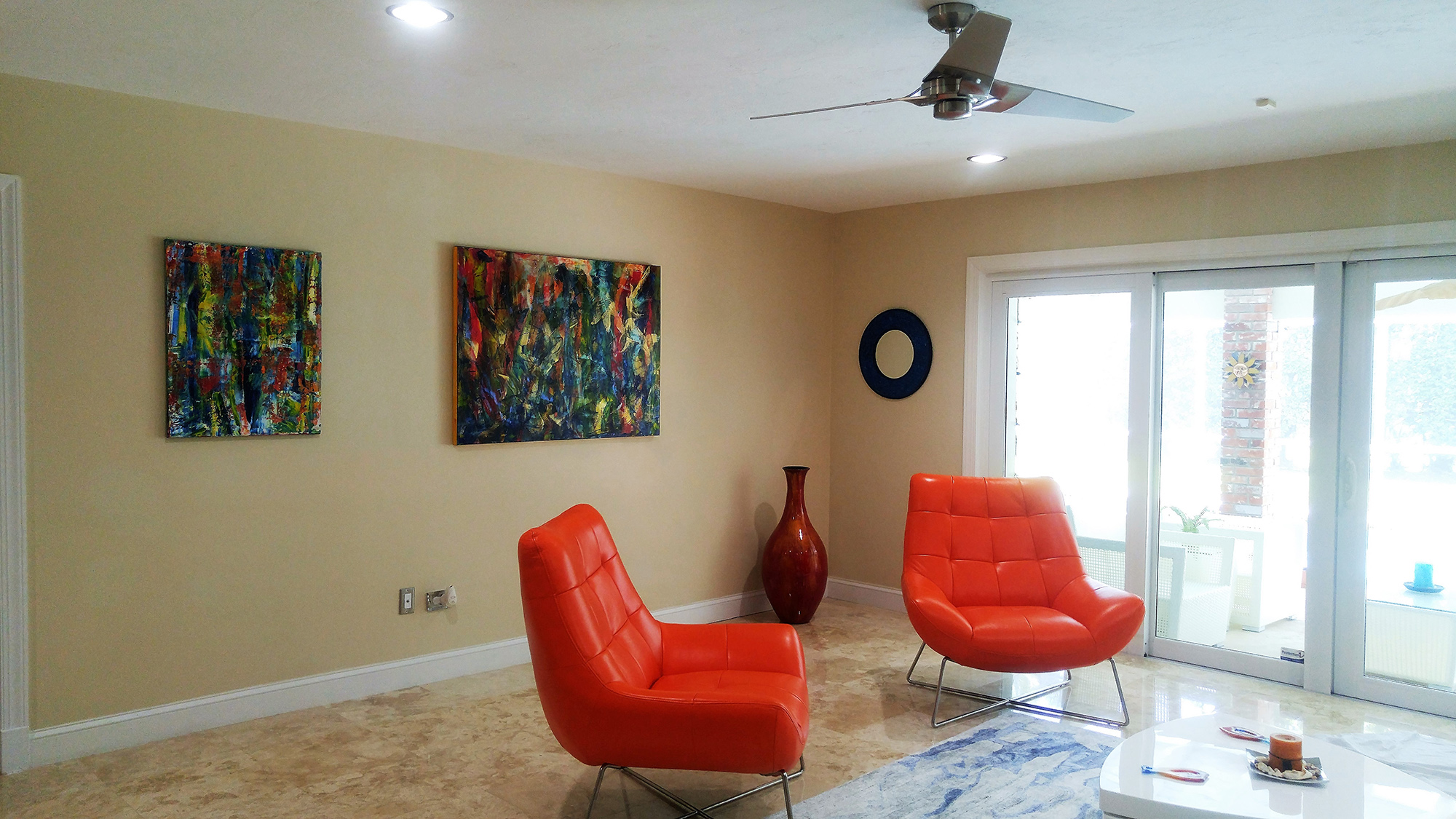SOLD artwork displayed in the collector's home in Florida. They look amazing in that bright cheerful room!