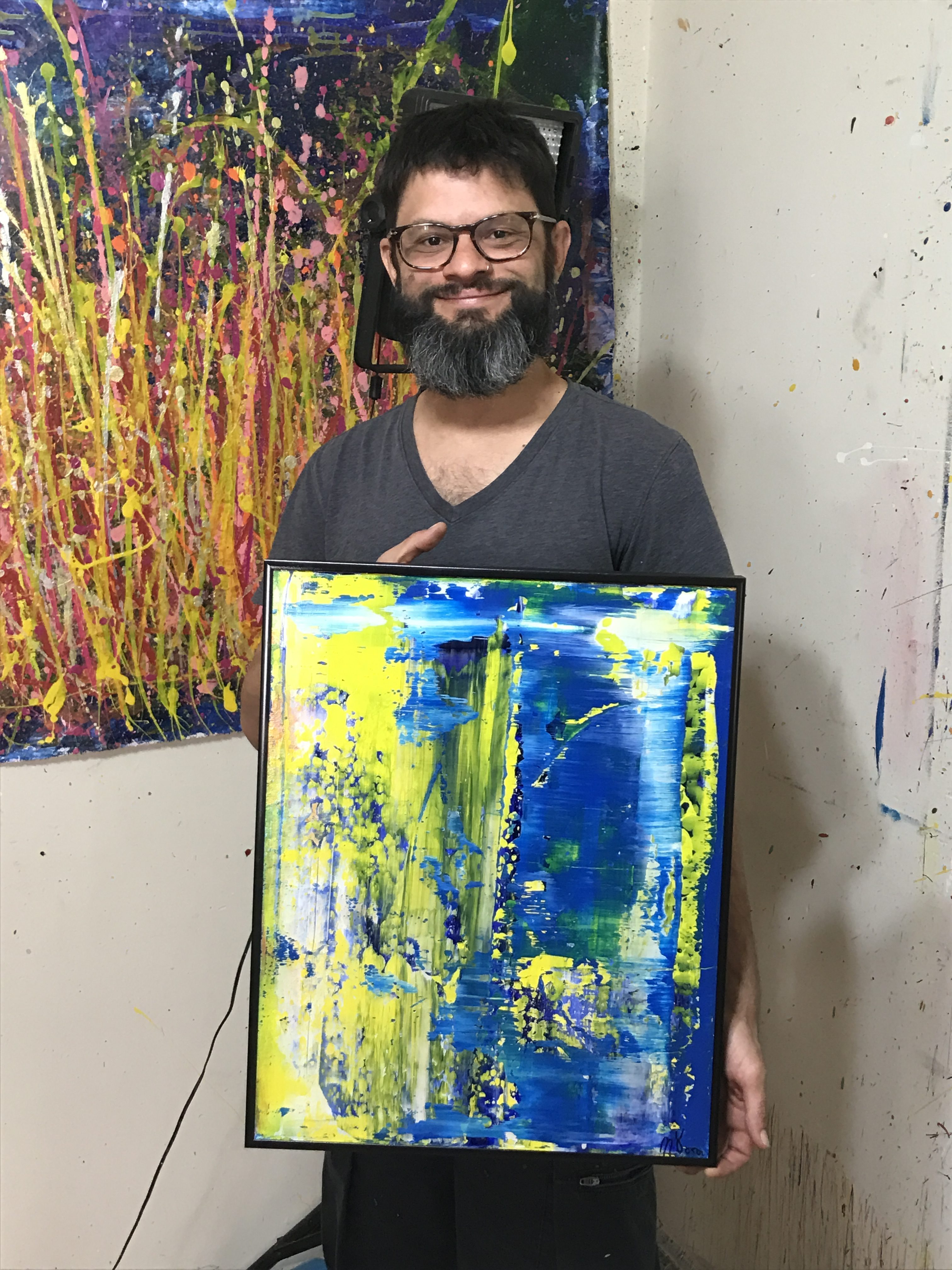 Los Angeles abstract artist Painter Nestor Toro with sold artwork