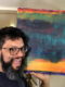 Los Angeles abstract painter Nestor Toro with his work "Perhaps a Sunset"
